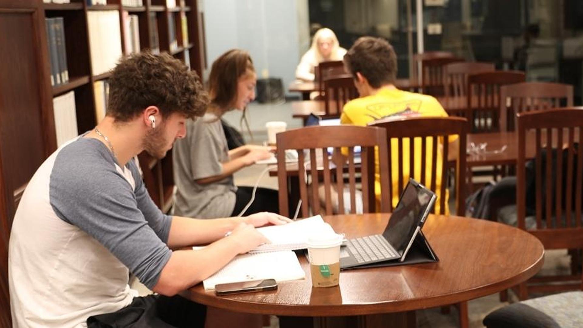 Student studying at table