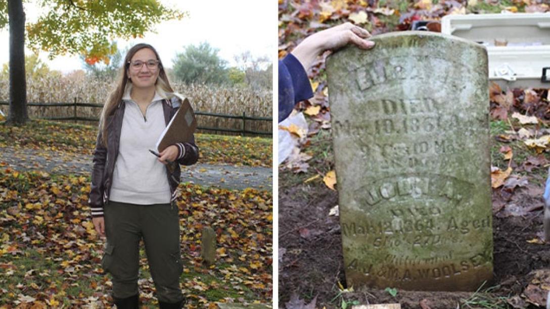 Associate professor poses for photo in cemetary